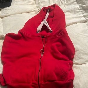 Read cropped Kendall and Kylie, a sweater